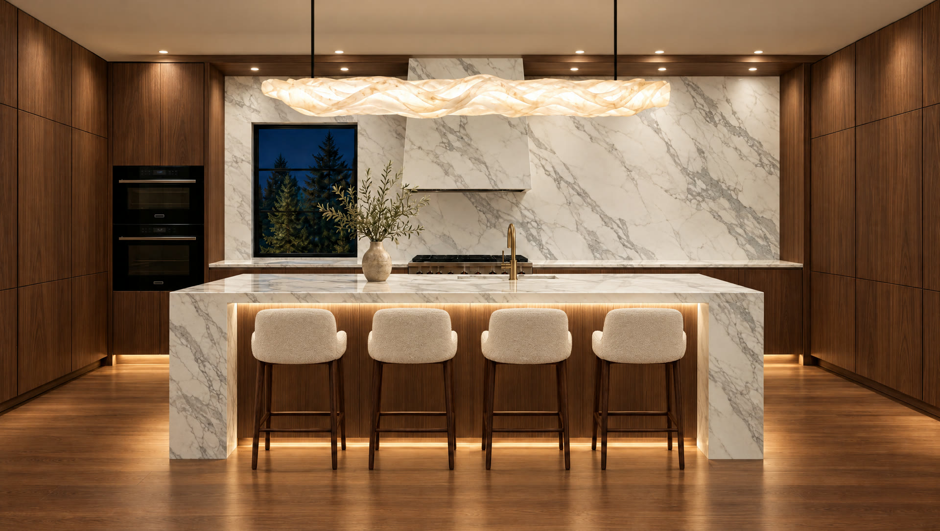 The same kitchen in rift-cut walnut with Calacatta marble